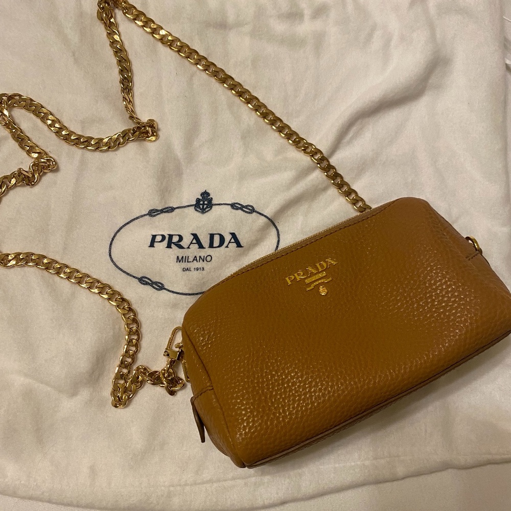 Prada grained color tan leather clutch